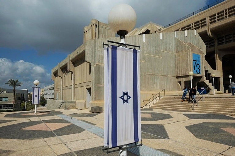 Israeli flags hanged outside the humanities and social sciences building on the Ben-Gurion University of the Negev campus in southern Israel. Israeli flags hanged outside the humanities and social sciences building on the Ben-Gurion University of the Negev campus in southern Israel.