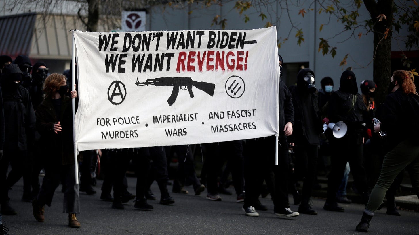 Portland Protesters Smash Windows of Local Democratic Party Headquarters - The New York Times