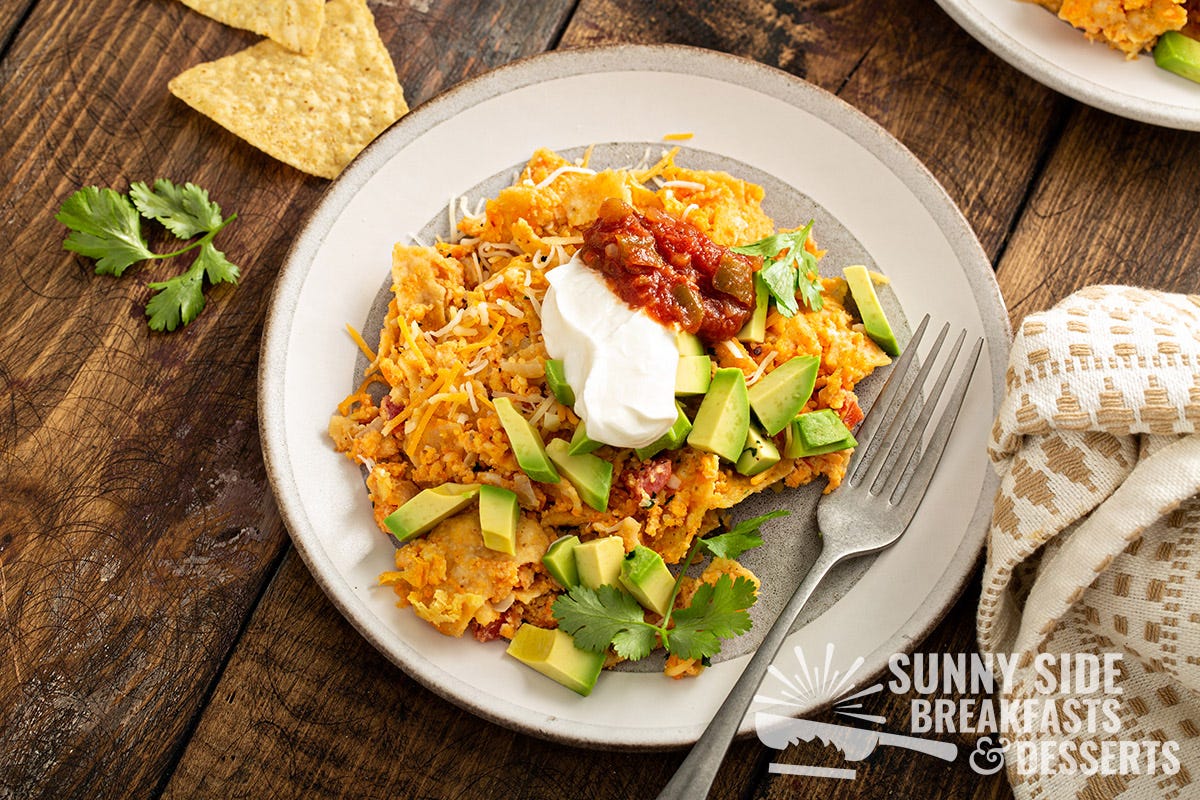 Sweet potato migas served on a plate with toppings.