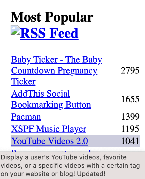 A screenshot of the "Most Popular" section from the Widgetbox website, taken from the WayBackMachine. It shows "YouTube Videos 2.0" highlighted behind a baby ticker, "AddThis" bookmark button, Pacman, and an XSPF music player. The tooltip says "Display a user's YouTube videos, favorite videos, or a specific videos (sic) with a certain tag on your website or blog! Updated"