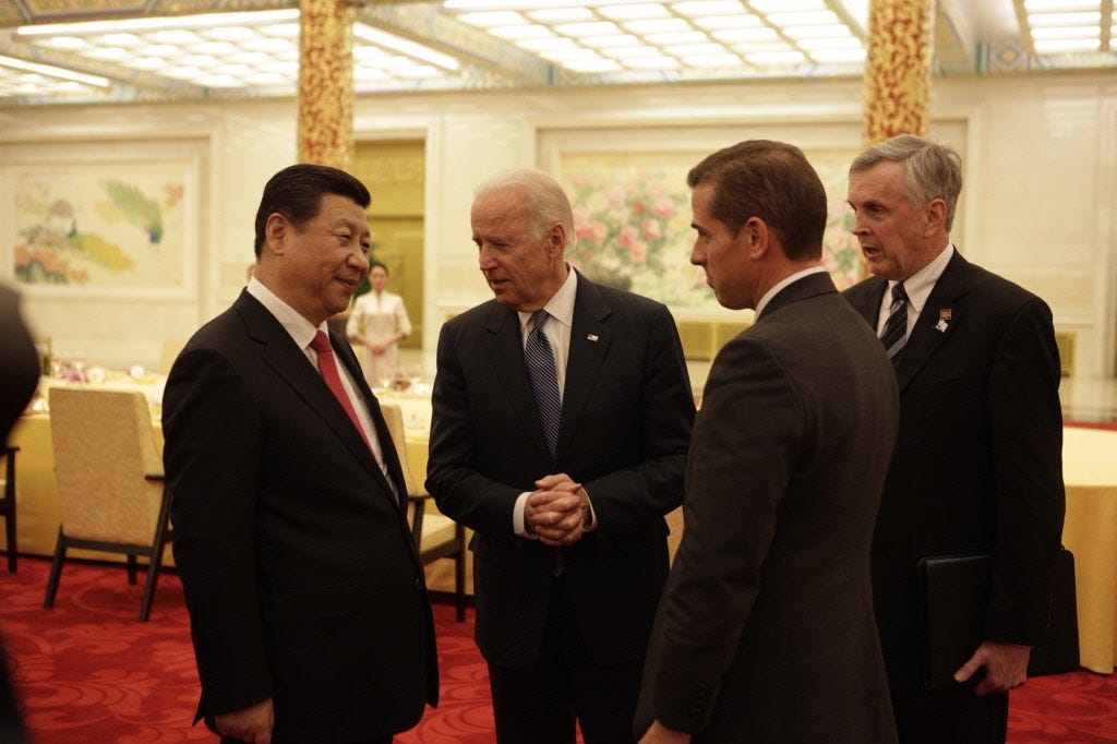 Then-Vice President Joe Biden introduces his son, Hunter Biden, to Chinese President Xi Jinping in December 2013.