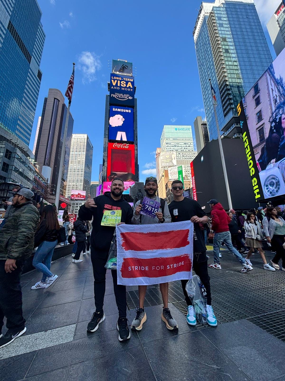 Brian, Ozcar, and Hector in Times Square before the NYC Half. 