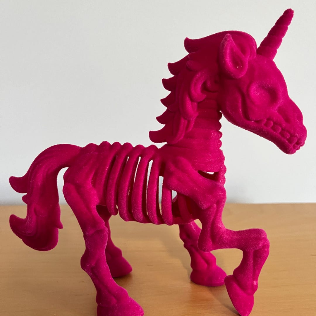 Hot pink unicorn skeleton