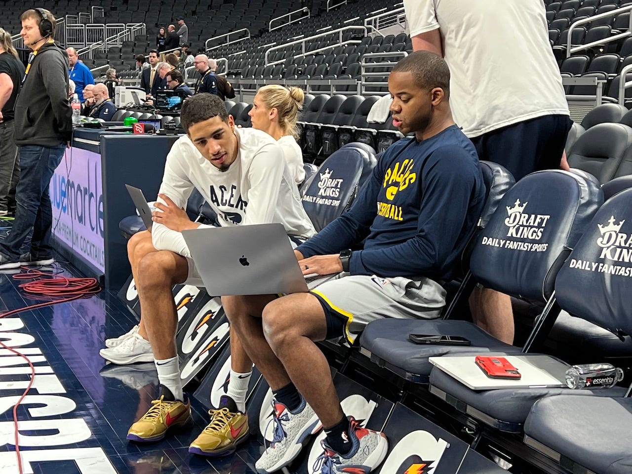 Tyrese Haliburton watches film with assistant Ronald Nored before every game.