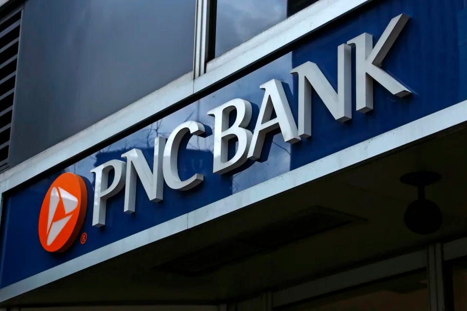 This Jan. 12, 2017, photo shows sign for a PNC Bank in Pittsburgh. (AP Photo/Gene J. Puskar)