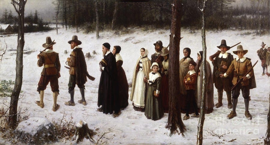 A group of people in clothing standing in the snow

Description automatically generated with low confidence