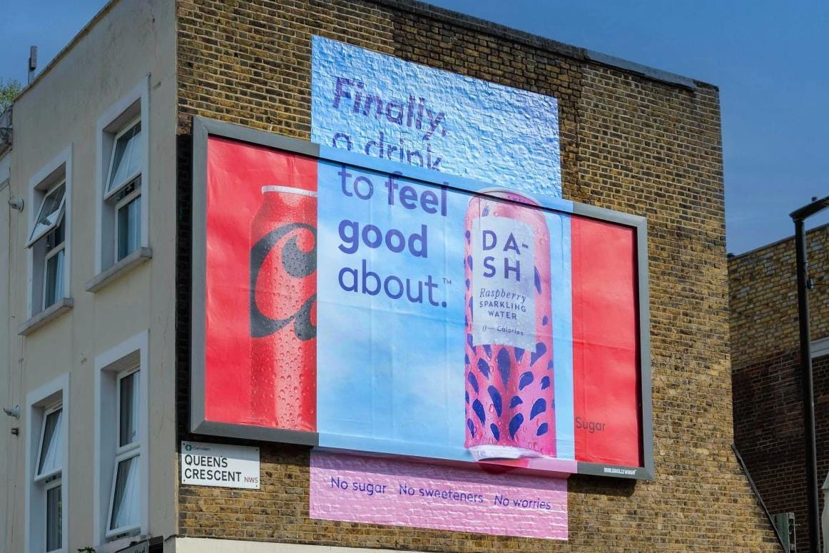 Dash Water takes swipe at Coca-Cola in billboard stunt | The Grocer