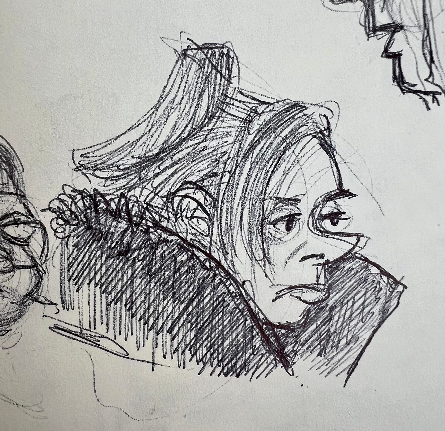 Quick thumbnail sketch of a woman looking extremely pissed off, but who was probably just thinking. 