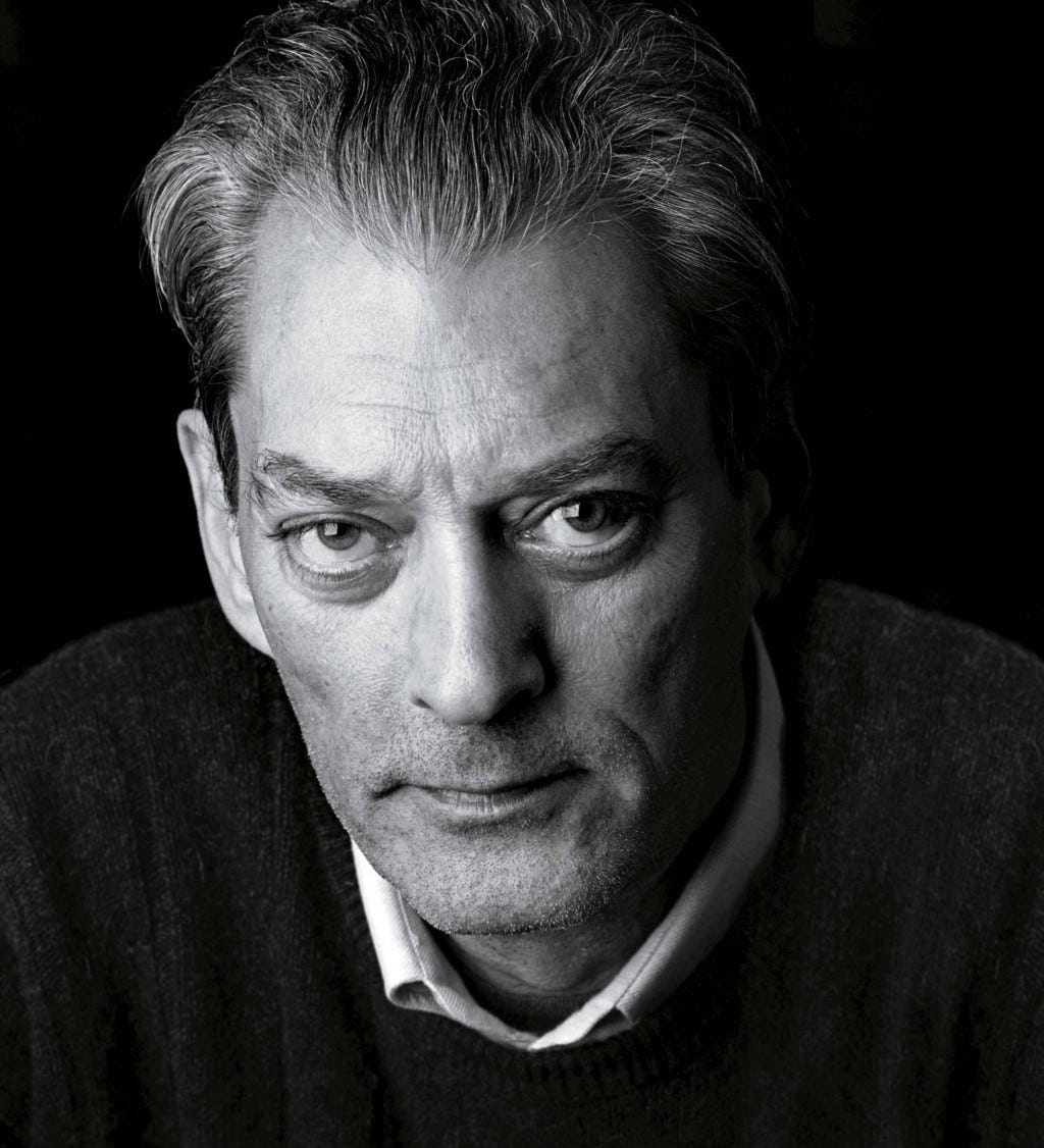 Paul Auster black and white headshot staring into camera