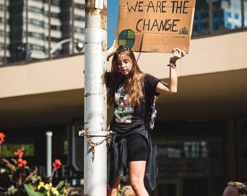 Gen Z girl protesting about sustainability