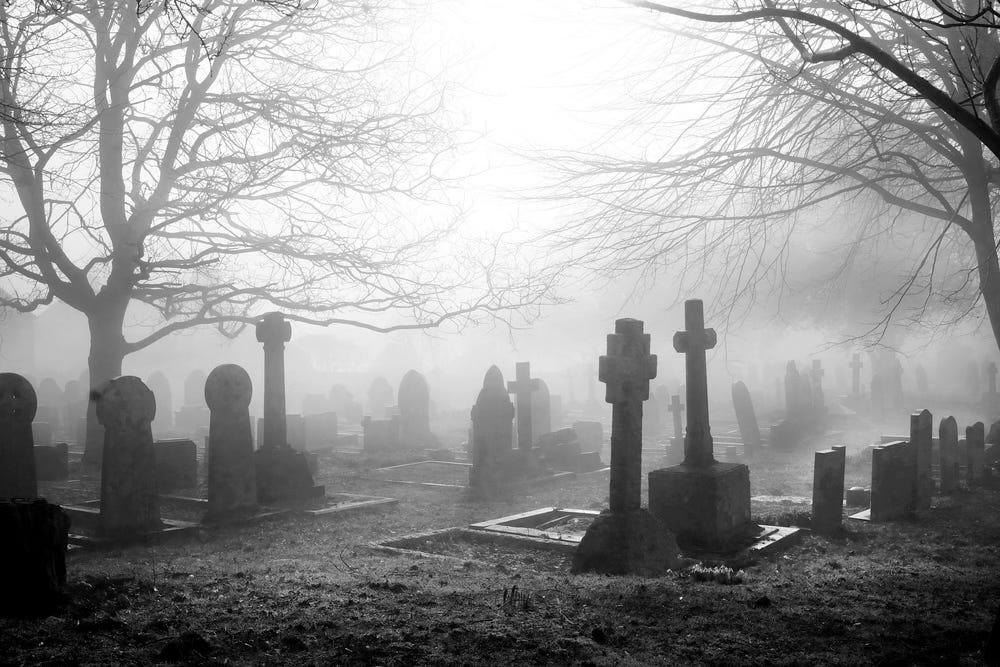 Cemetery in the fog - image in b&w