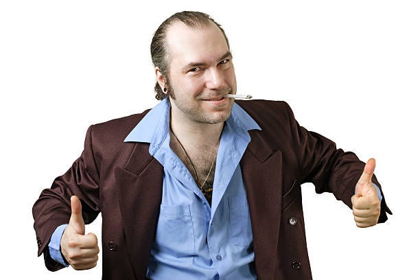 Sleazy guy two thumbs up  sleazy salesman stock pictures, royalty-free photos & images