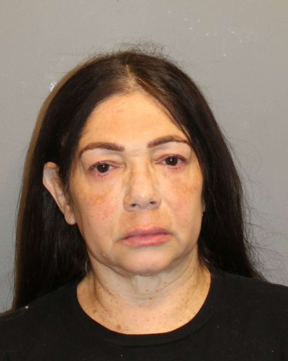 Stefanie Sanabria has resigned as a math coach at Brookside Elementary School in Norwalk after she was accused of using a chokehold on students, official says.