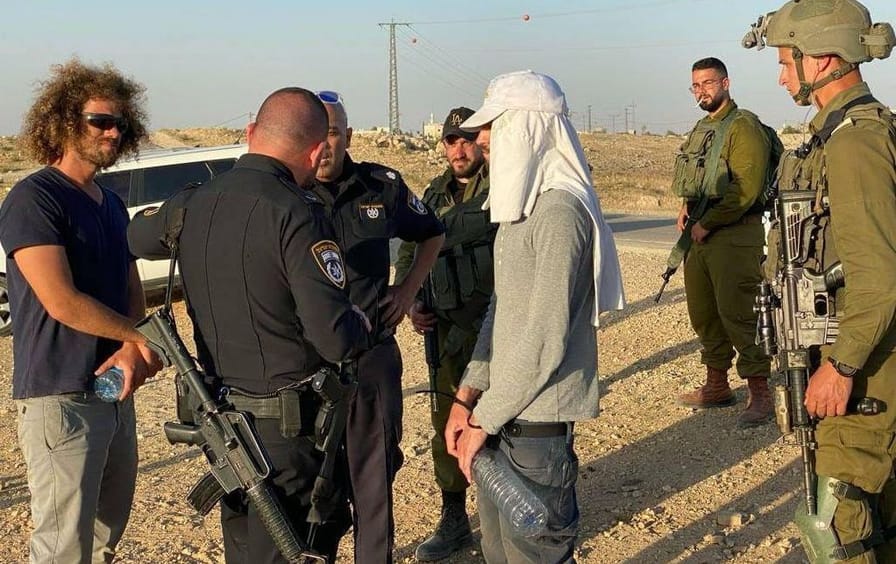 Hayim Katsam with soldiers and security forces in the West Bank.