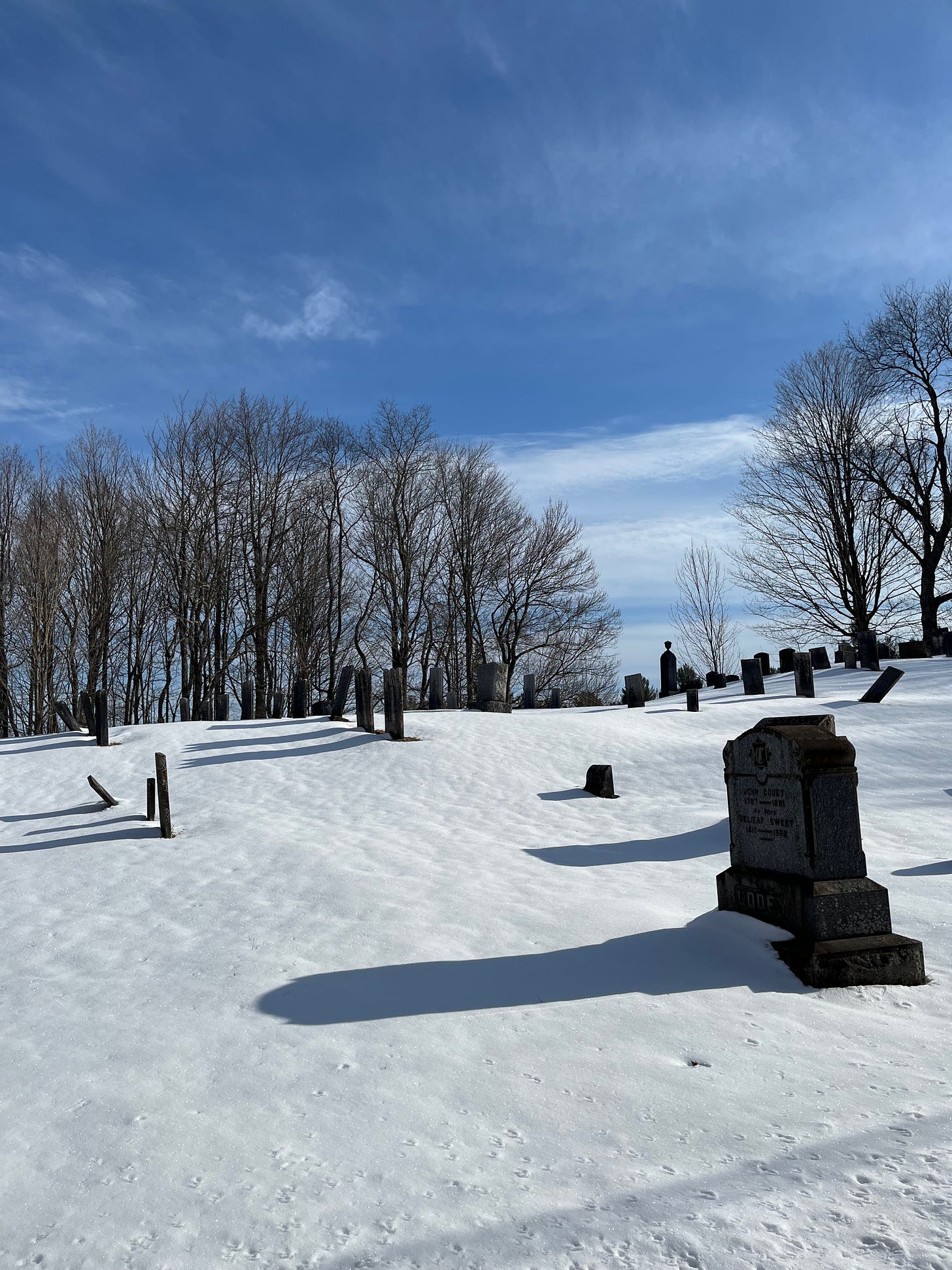 Snow covered country cemetary