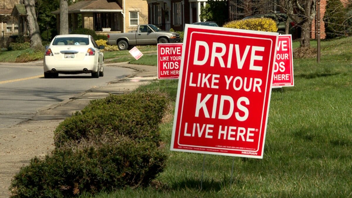Drive like your kids live here' signs pop up in Huntington