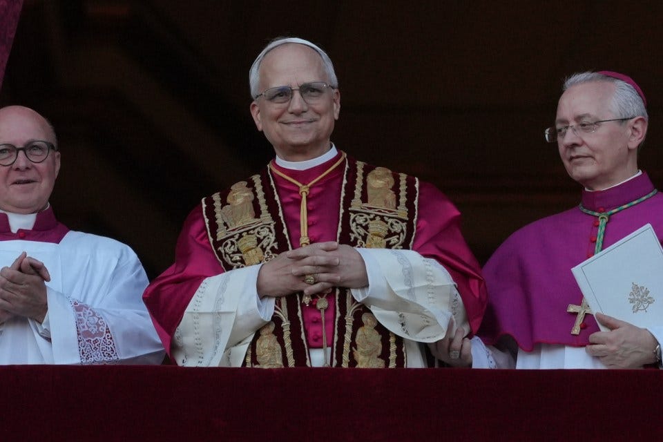 Pope Leo XIV appearing on the balcony of St. Peter's Basilica after his election.