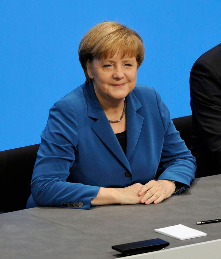 Angela Merkel in a blue jacket