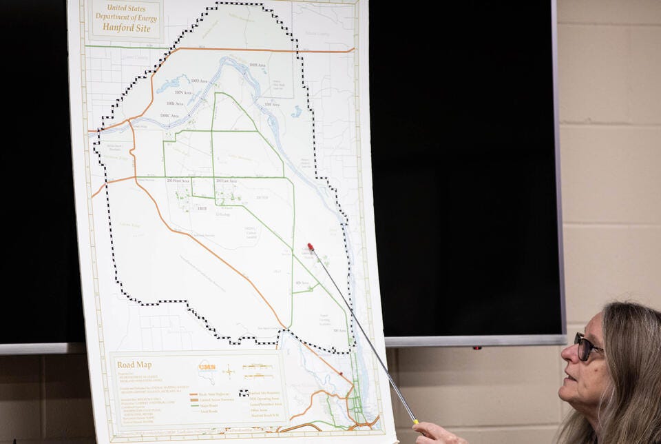 Tour guide Terry Andre explains how big the Hanford site is before visitors take a tour of B Reactor in 2022. The Hanford site is 586 square miles in area. Tour guide Terry Andre explains how big the Hanford site is before visitors take a tour of B Reactor in 2022. The Hanford site is 586 square miles in area.