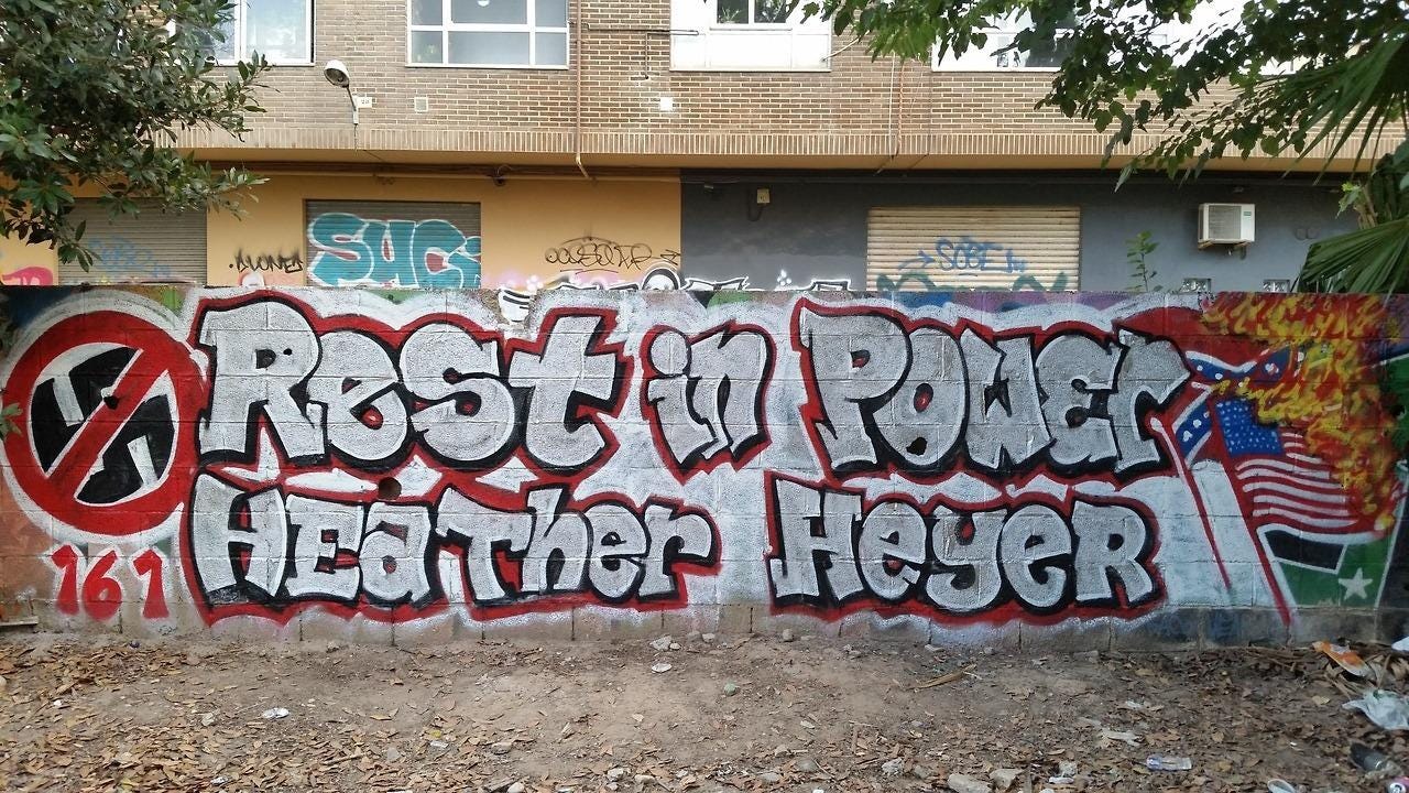 From Radical Graffiti Solidarity mural in Valencia, Spain,  for Heather Heyer, an anti-fascist protester murdered in a nazi attack in  #Charlottesville, Virginia on the 12th of August 2017