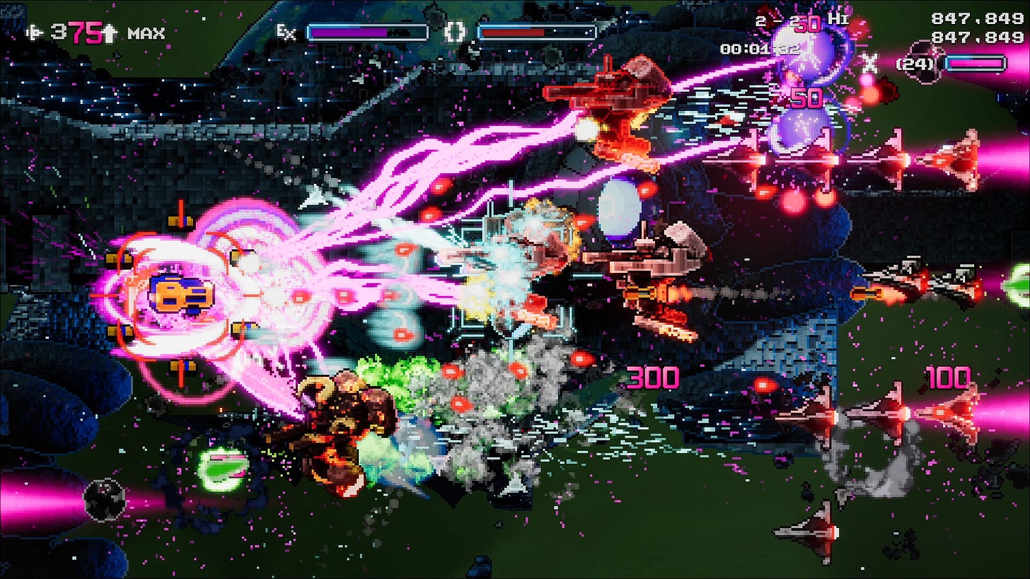 A screenshot of gameplay from Schildmaid MX, featuring explosions, laser beams, a number of enemy ships, and red bullets that have to be avoided or else you'll die.