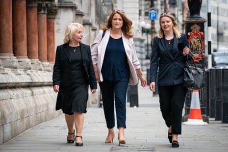 MP Kate Kniveton (centre) arriving at the Royal Courts of Justice in 2021. A family court judge found that her ex-husband, the former MP Andrew Griffiths, raped and abused her.
