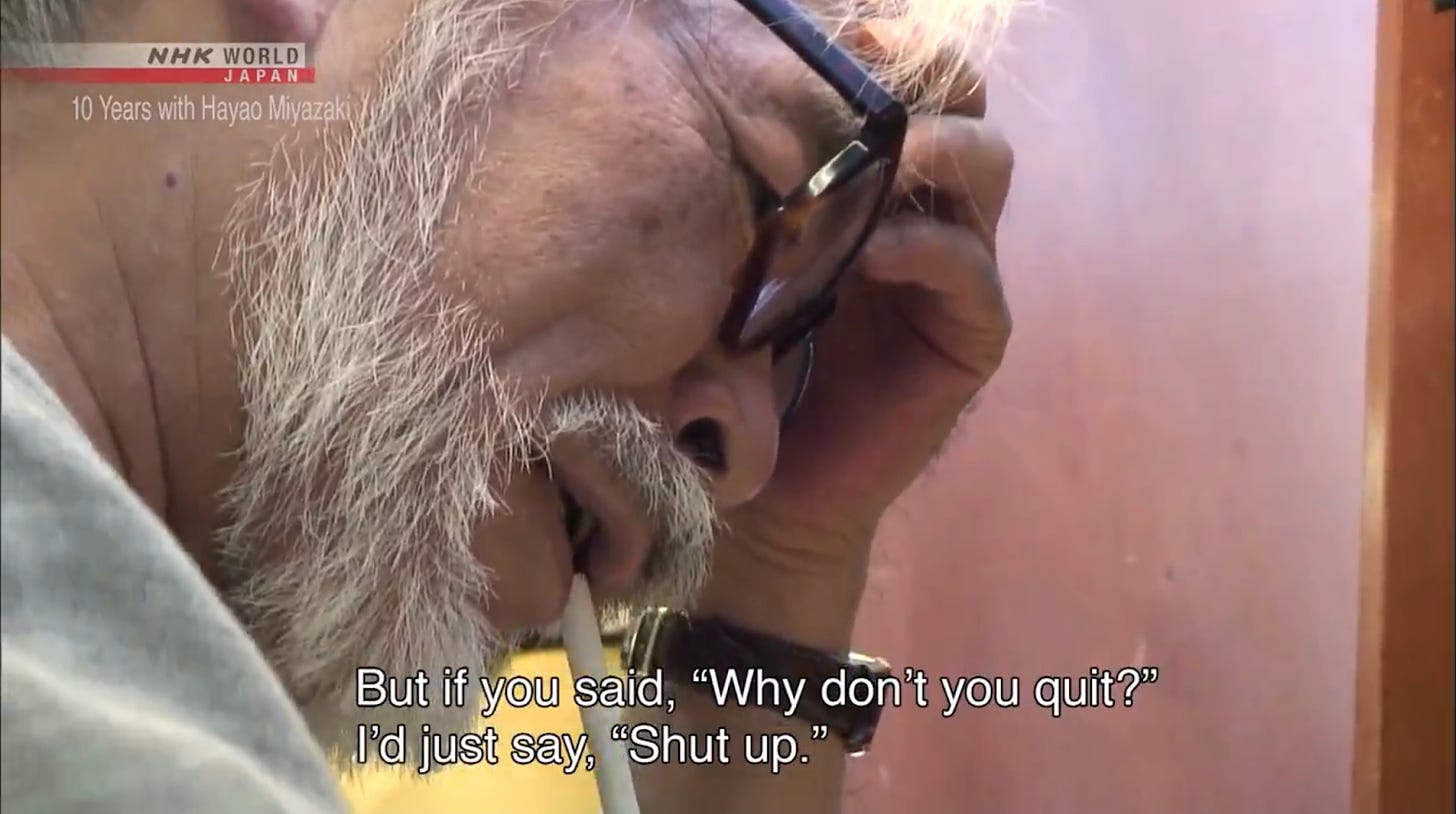 Hayao Miyazaki screen-capture of him with his head in his hands while the subtitle reads: "But if you said, "Why don't you quit?" I'd just say, "Shut up."