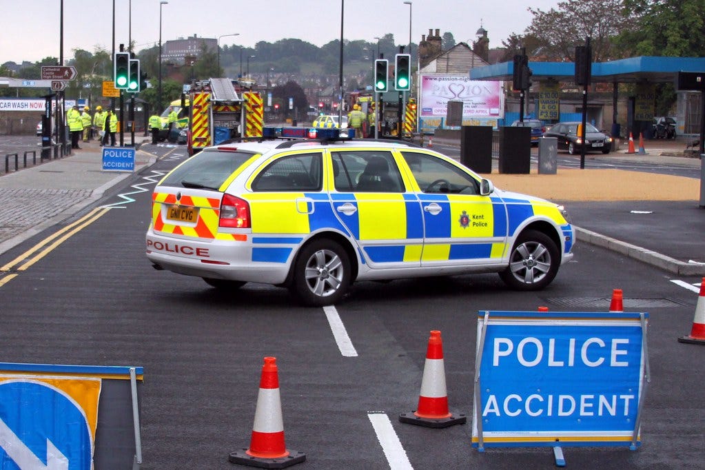 police car blocking a road