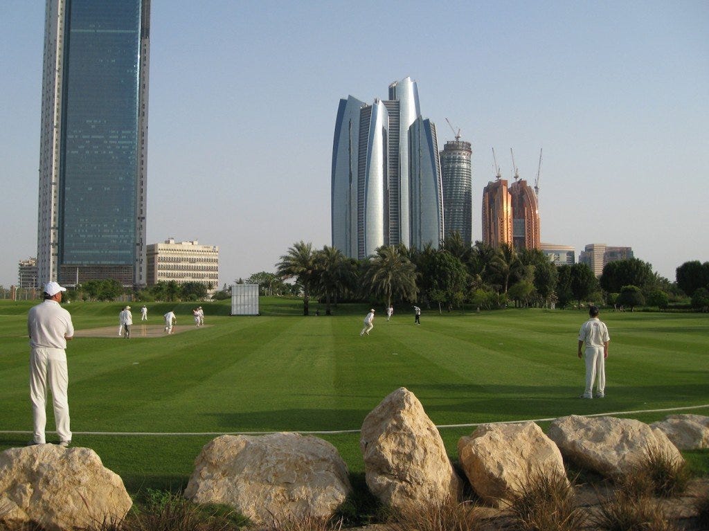 A stones throw from the beach, there's a perfect patch of Little England with a cricket match