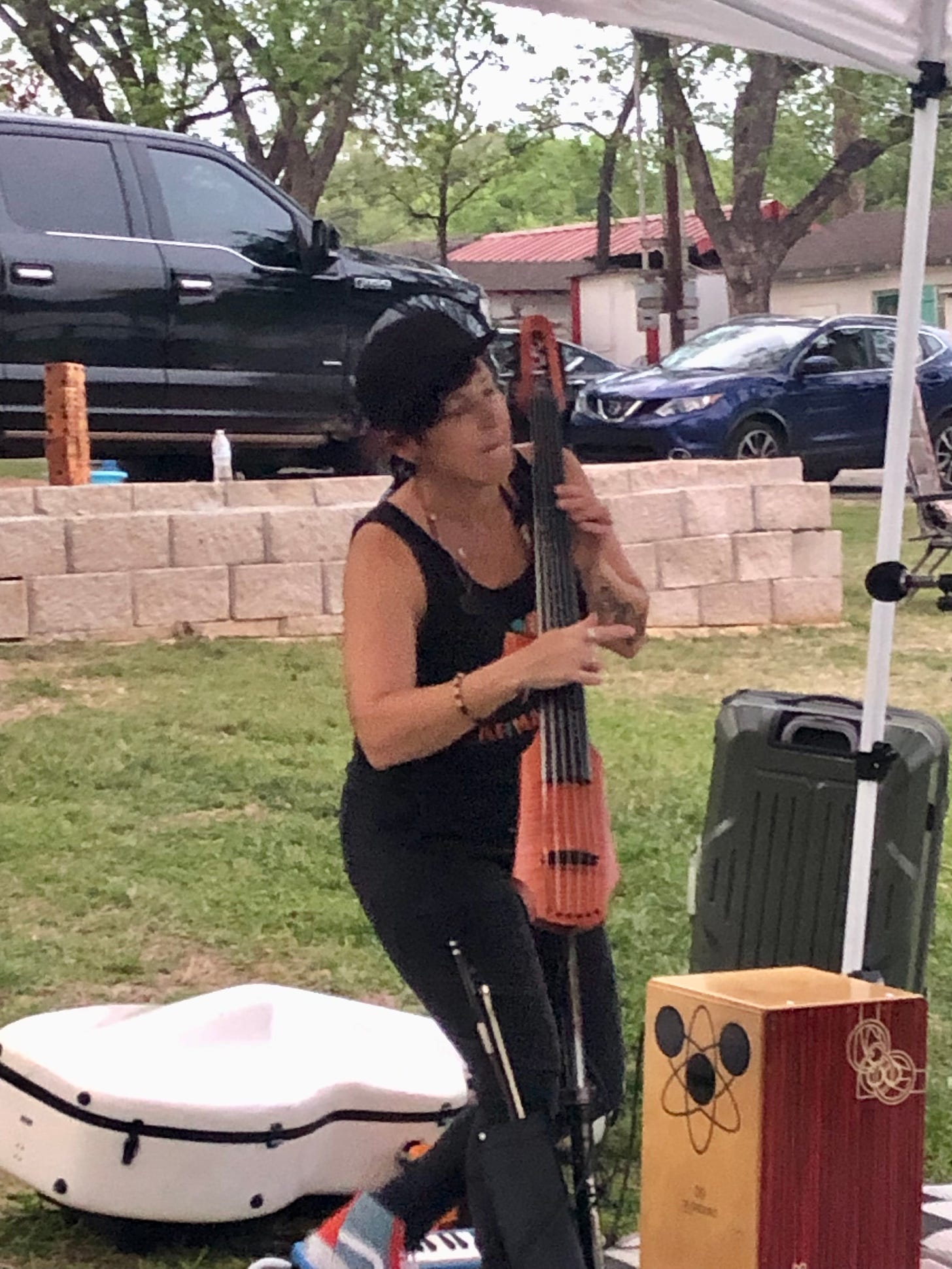 Jen performing with her electric six-string cello