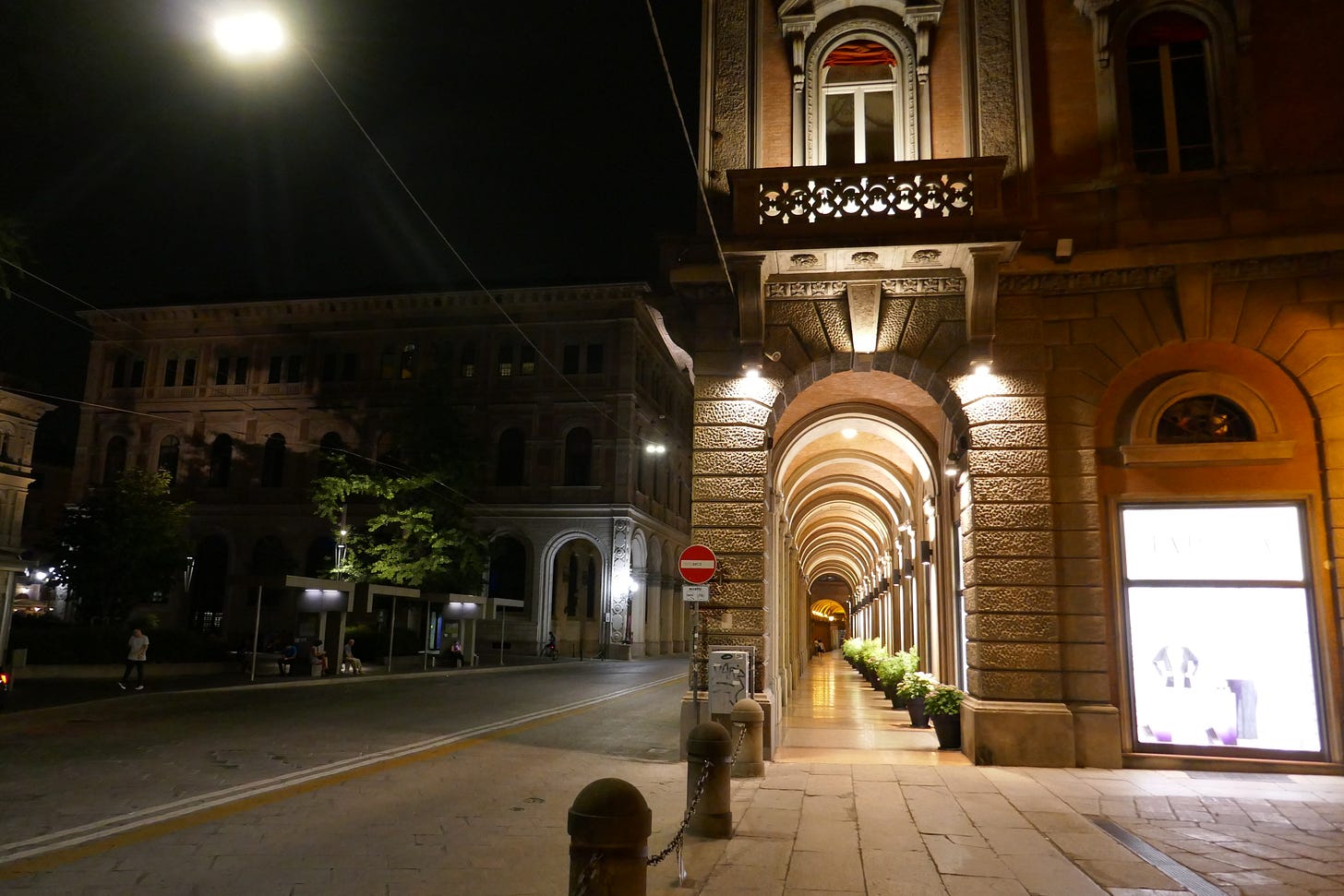 Nighttime scene of a deserted street in Bologna