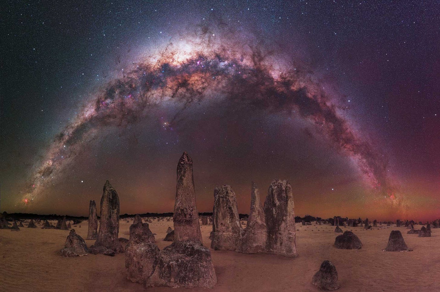 “THE MILKY WAY ARCHING OVER THE PINNACLES DESERT” – TREVOR DOBSON.jpg