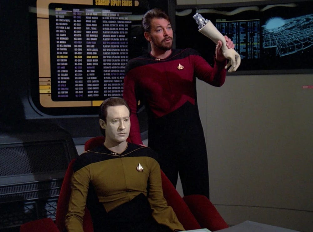 In the episode Measure of a Man, Riker is seen holding part of Data's arm.