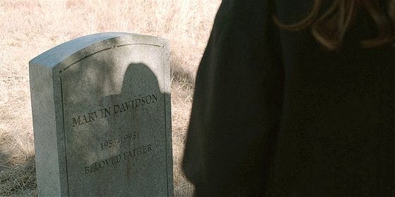 Denise at Marvs grave on Walker.