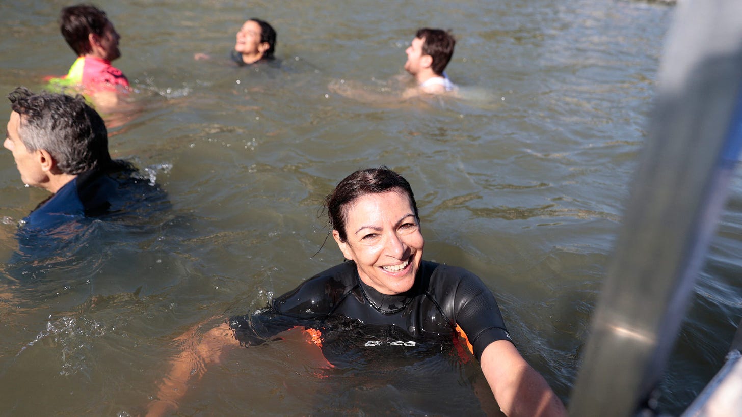 Paris Mayor Anne Hidalgo swims in Seine river ahead of Olympics