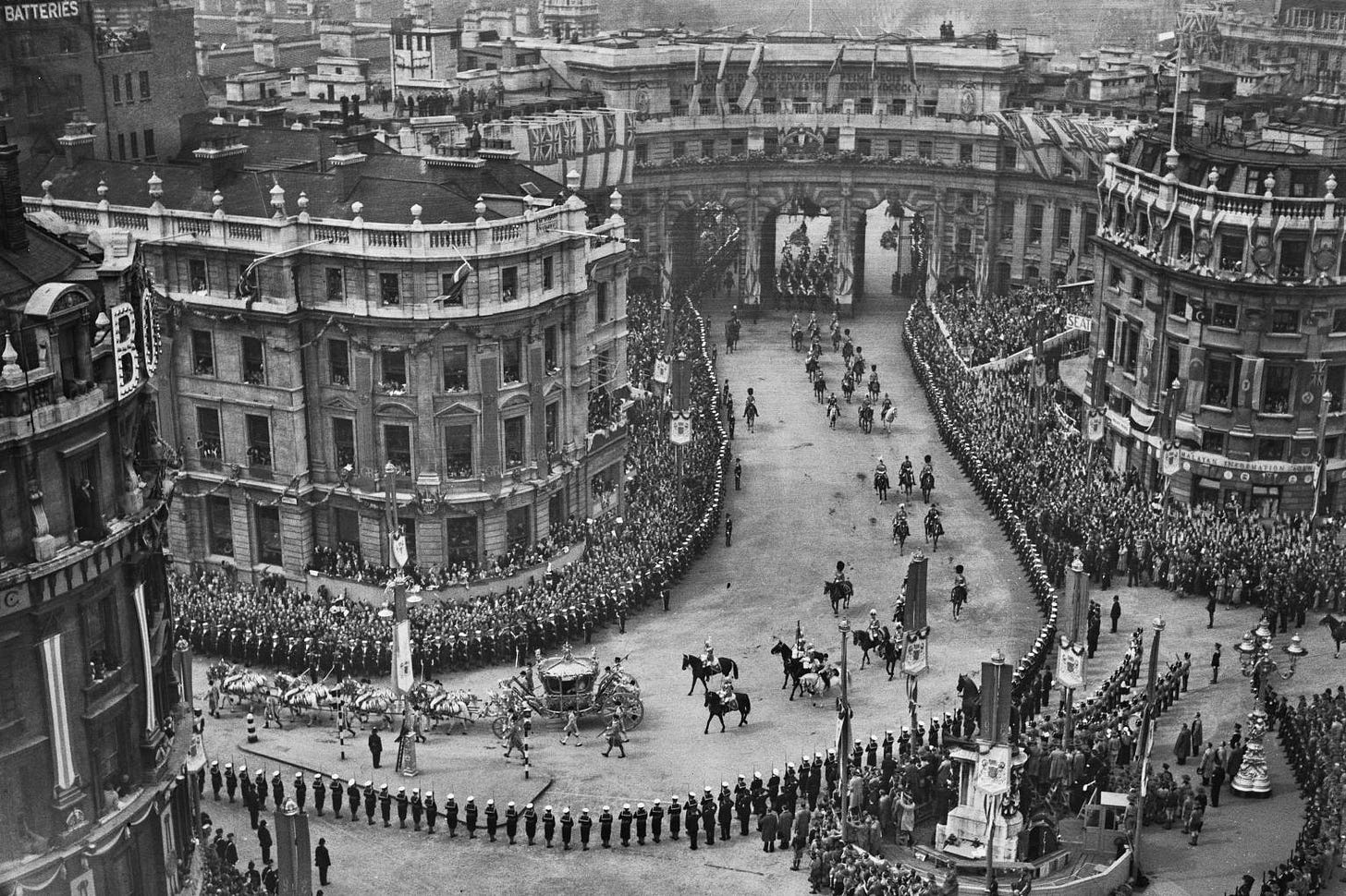 The Gold State Coach en route to the coronation ceremony at Westminster Abbey