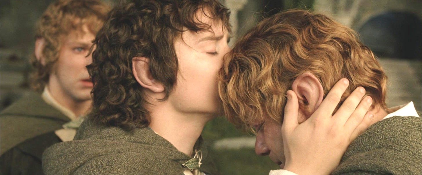 Frodo kisses Sam's head