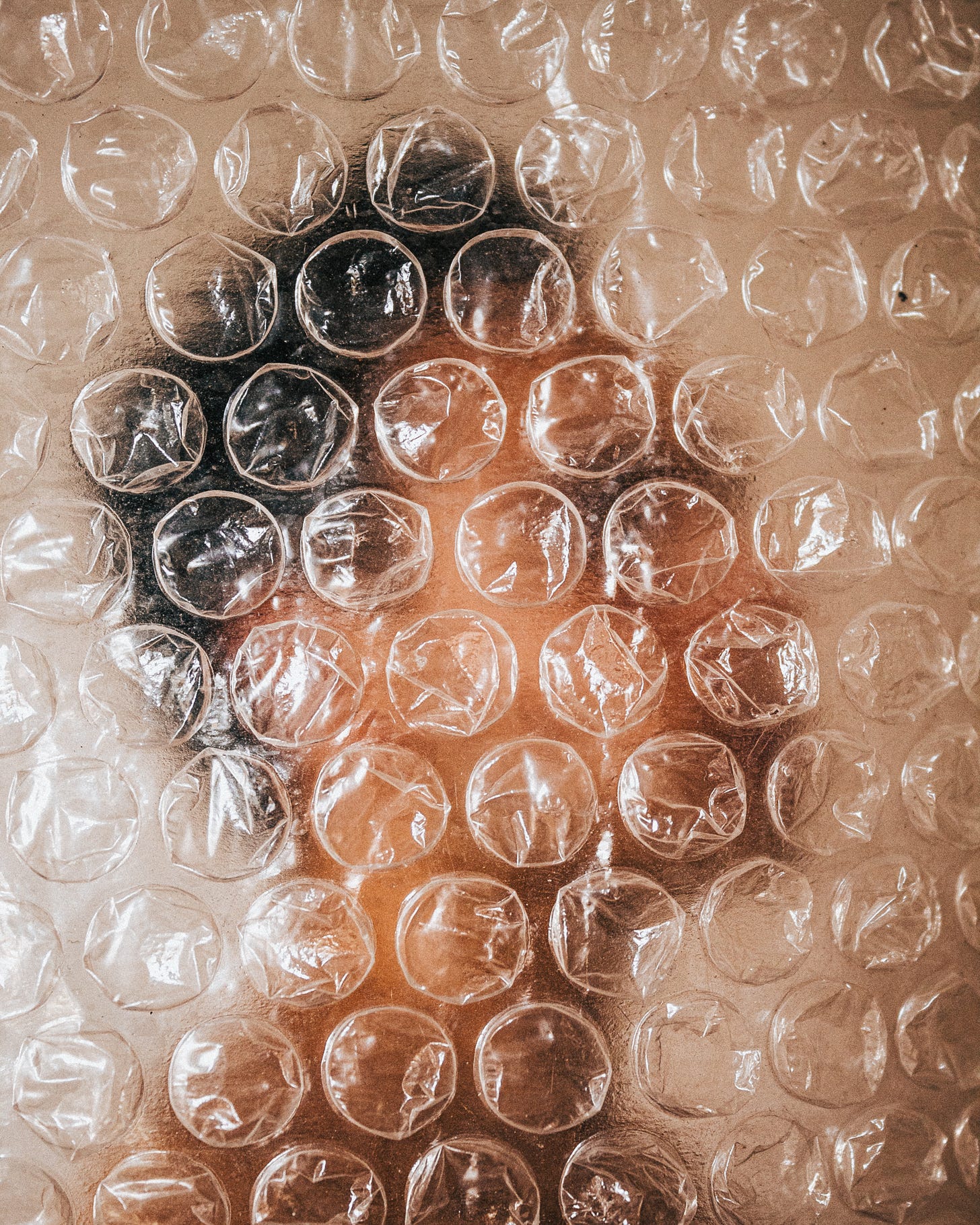 A man behind bubble wrap photo