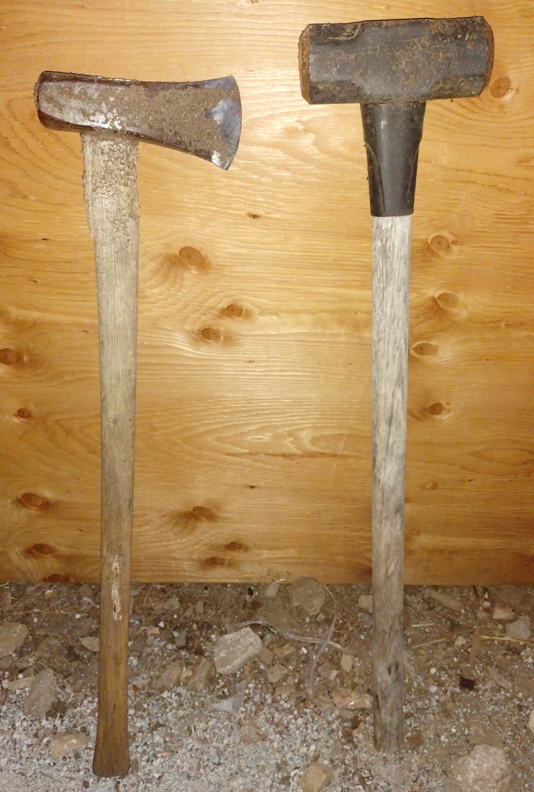 A splitting maul and a sledge hammer.