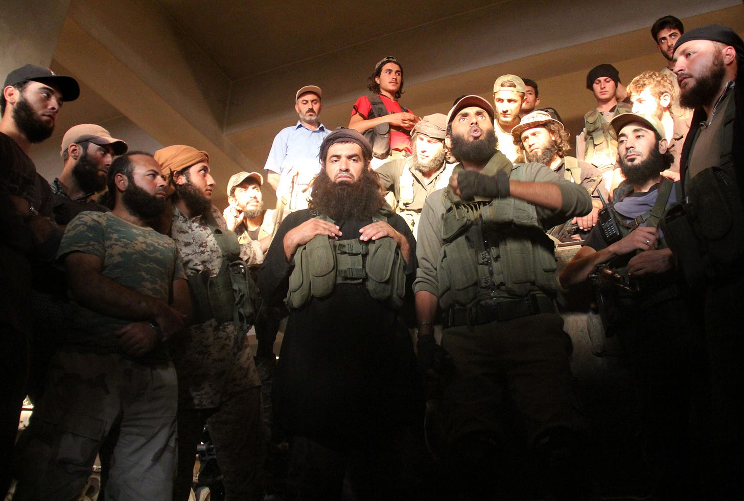 Fighters from the former Al-Nusra Front, renamed Fateh al-Sham Front in 2016. (AFP/Omar Haj Kadour via Getty Images.)
