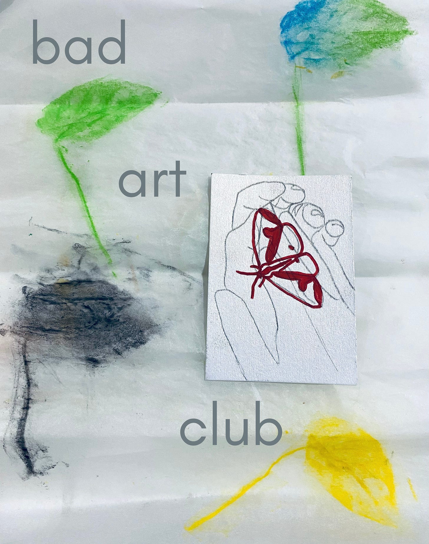 Transparent tracing paper with green, yellow, yellow and black leaf rubbings on it. A small pencil drawing of hands with a red marker drawing of a moth lays on top of the paper. The words "bad art club" are written in grey on to of the image.