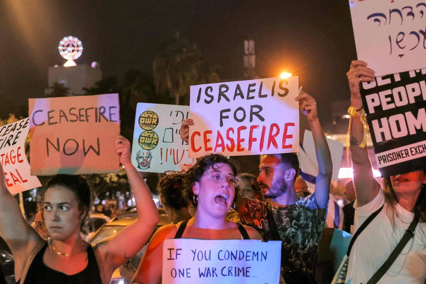 Israeli protesters demand ceasefire as Netanyahu vows 'long and difficult'  war