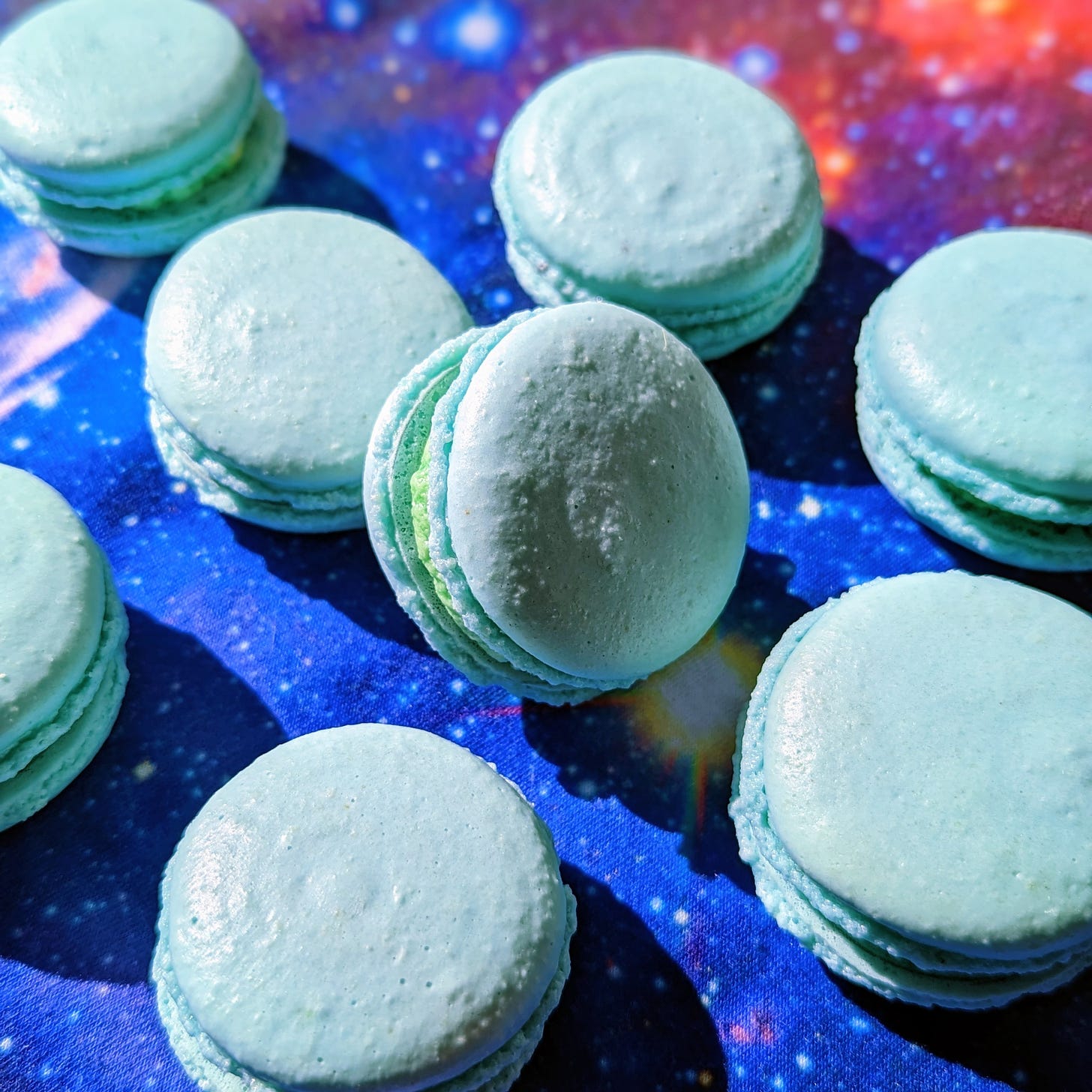 blue macarons on a galaxy background