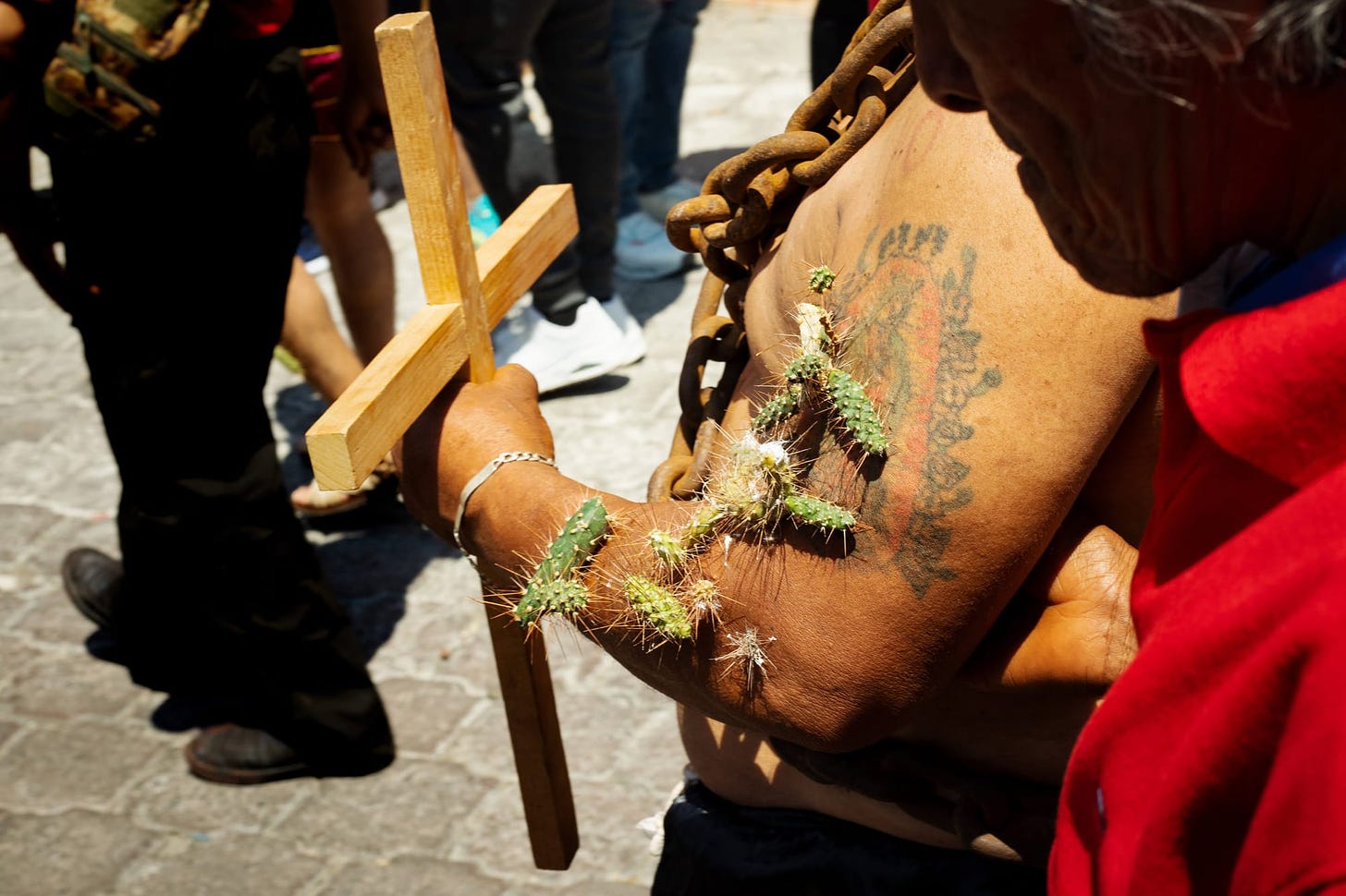 Los Engrillados of Atlixco: Mexican men in shackles with cacti stuck in their skin walk in pain to wash away their sins