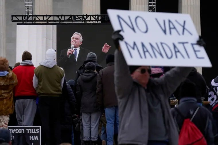Robert F. Kennedy Jr. is broadcast on a large screen as he speaks during an anti-vaccine rally in front of the Lincoln Memorial in Washington on Jan. 23.