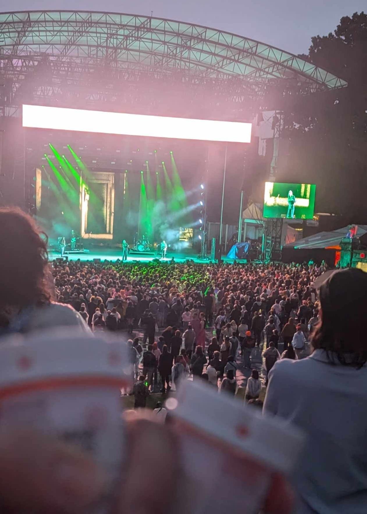 Two pill bottles held up to the stage