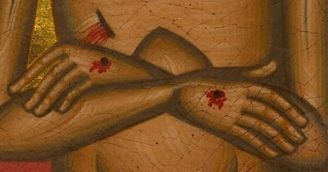 cropped-woundedhands-1.jpg