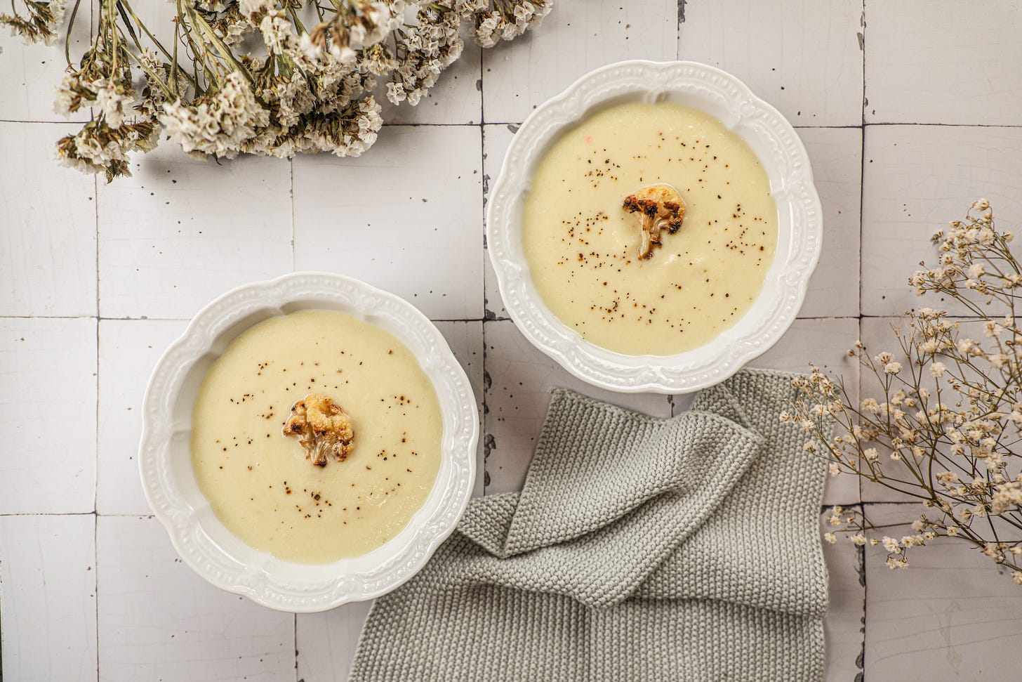 Two bowls of cauliflower soup