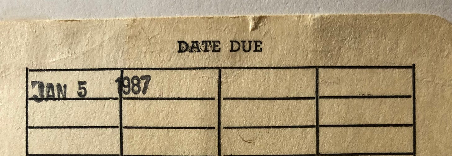 An old date due slip from the back of a library book.