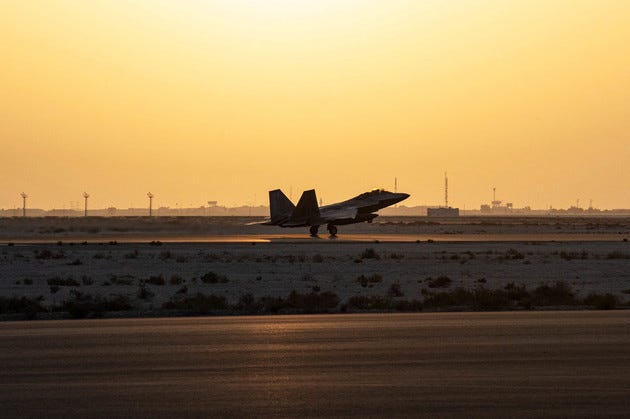 In this photo released by the U.S. Air Force, a U.S. Air Force F-22 Raptor arrives at Al-Dhafra Air Base in Abu Dhabi, United Arab Emirates, Saturday, Feb. 12, 2022. 